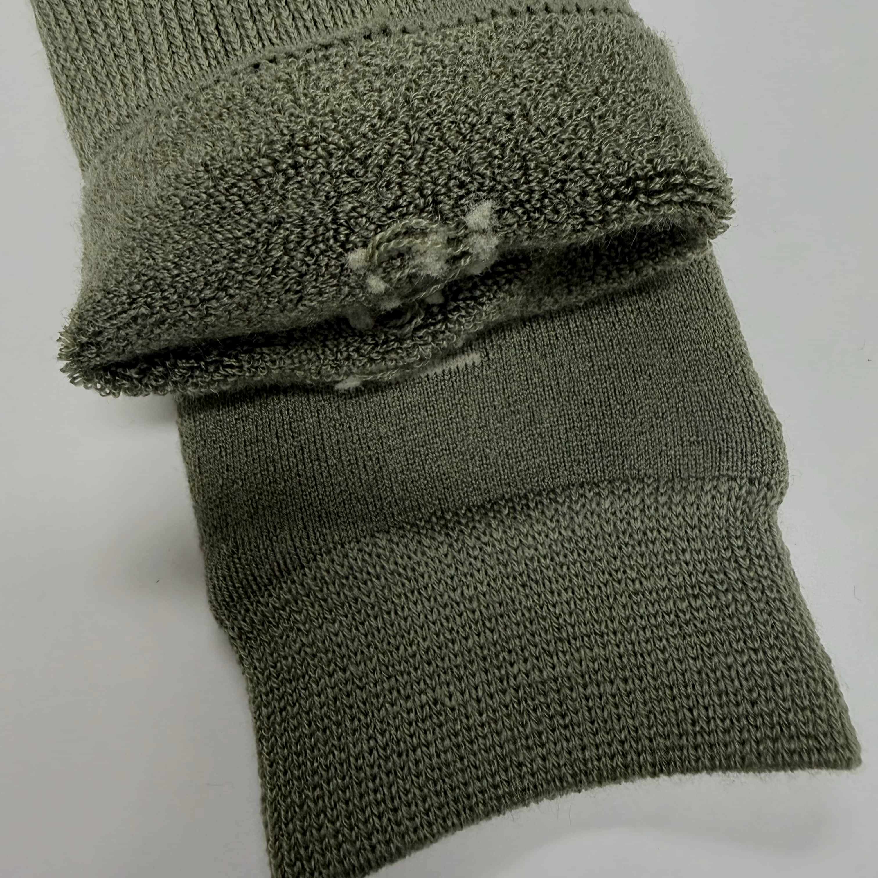 XTM Heater Merino Wool Blend Winter Socks with cushioned thermal design for hiking and cold weather comfort, sizes 2–14.