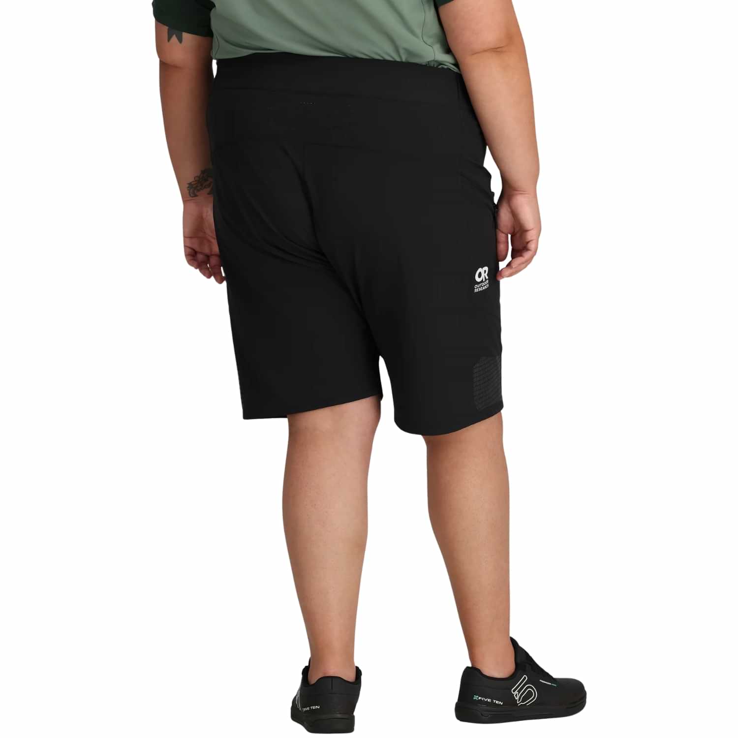 Back view of Outdoor Research Freewheel Women’s Plus Size Shorts in black, featuring lightweight stretch fabric, relaxed fit, and reflective detail for hiking, walking, and outdoor adventures.