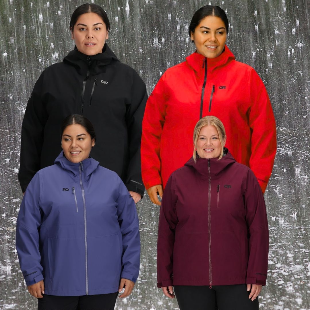 Four plus-size women modeling the same jacket style in four different colors: black, bright red, periwinkle blue, and burgundy. The jackets feature a high collar, full-length front zipper, and a small embroidered 'OR' logo on the left chest.