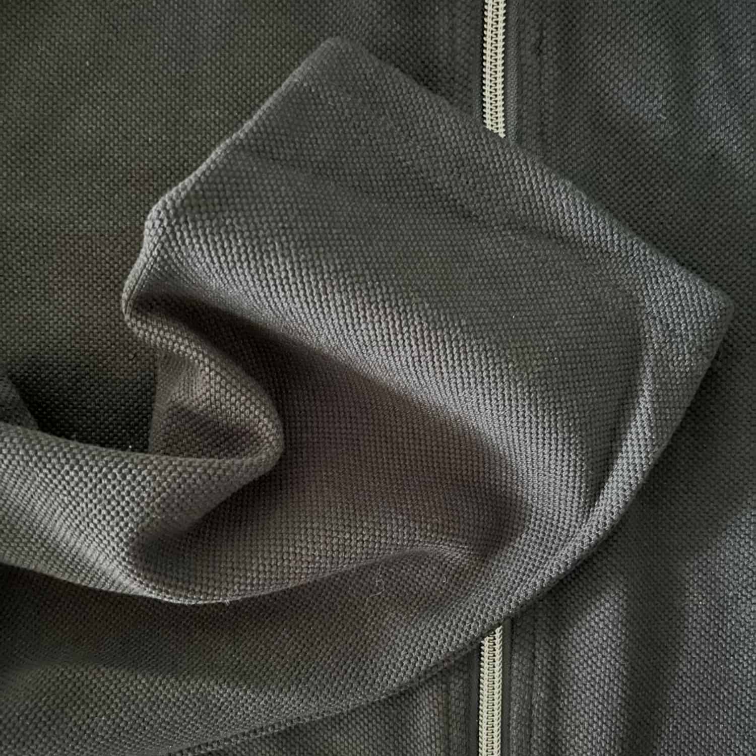 Stoy Powerstretch Men’s Plus Size Zip Jacket fabric detail in dark navy with soft stretch texture and front zip design.