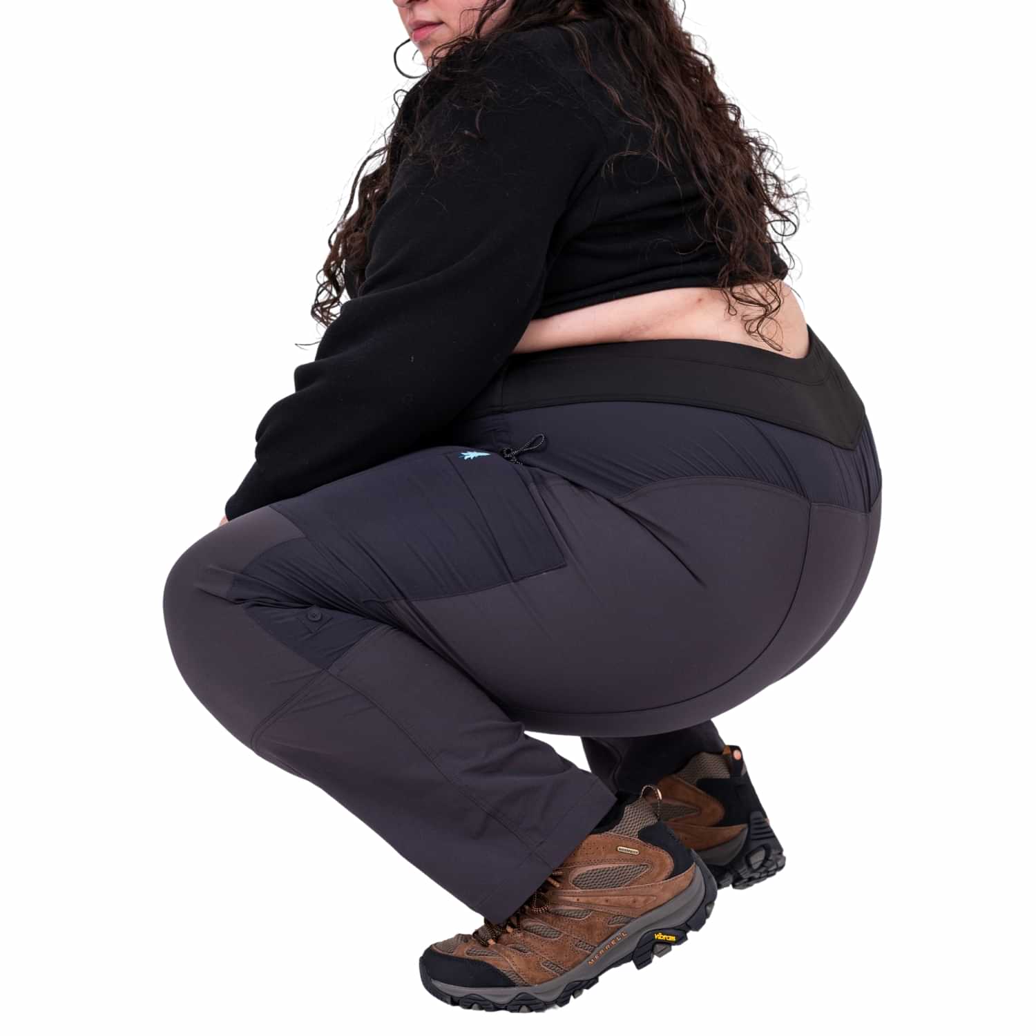 Plus size woman wearing Thicket Adventure Brecken Hiking Pants BOOTY FIT with reinforced panels.