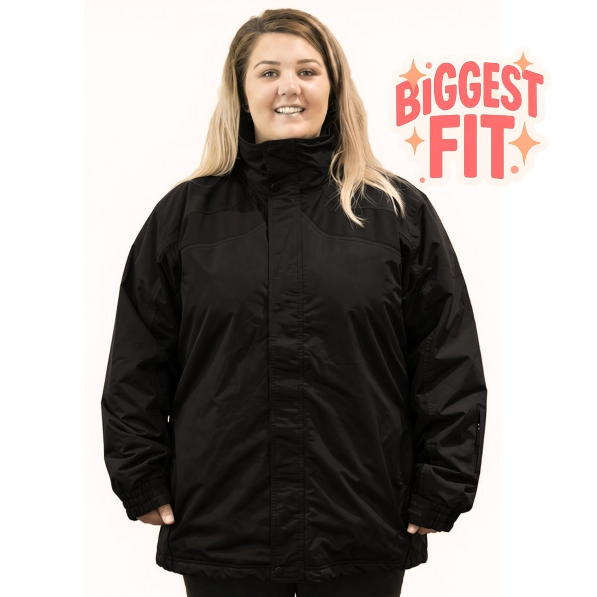 A plus size woman wearing a black hooded jacket with a high collar and front zipper, standing against a white background with a red 'BIGGEST FIT.' graphic in the upper right.