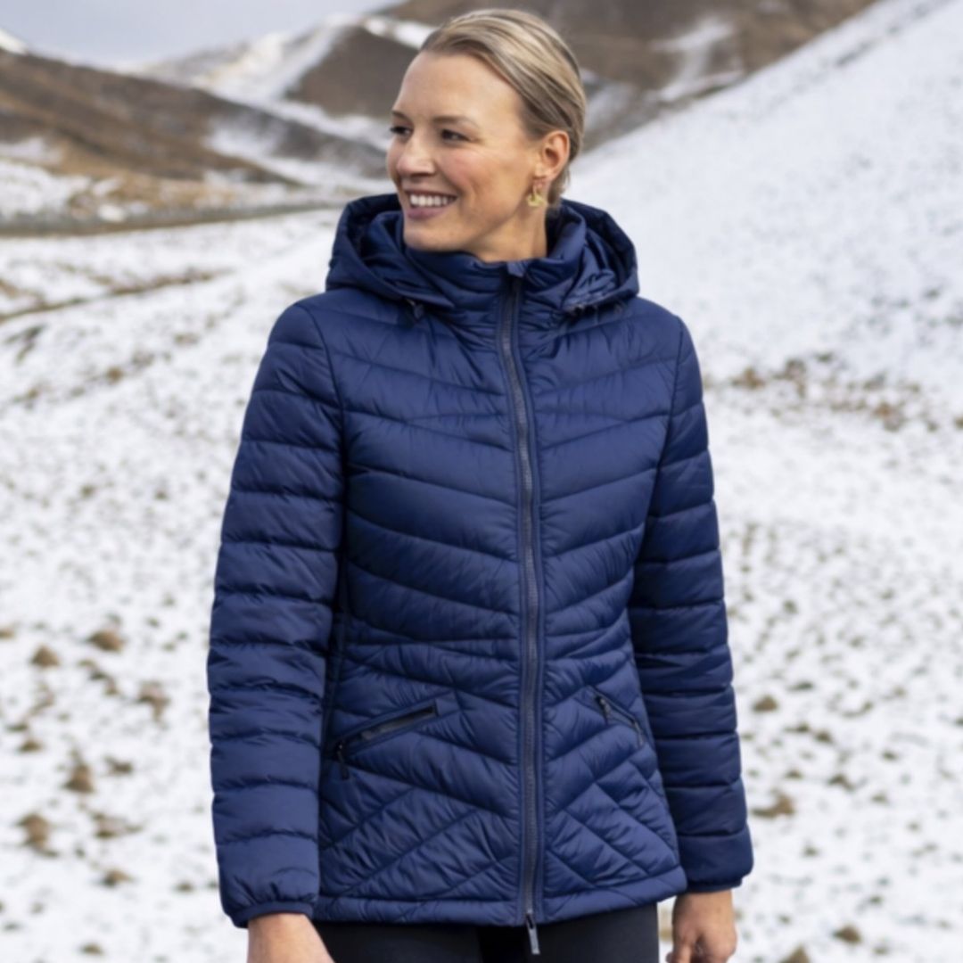Woman wearing cushla jacket in the snow