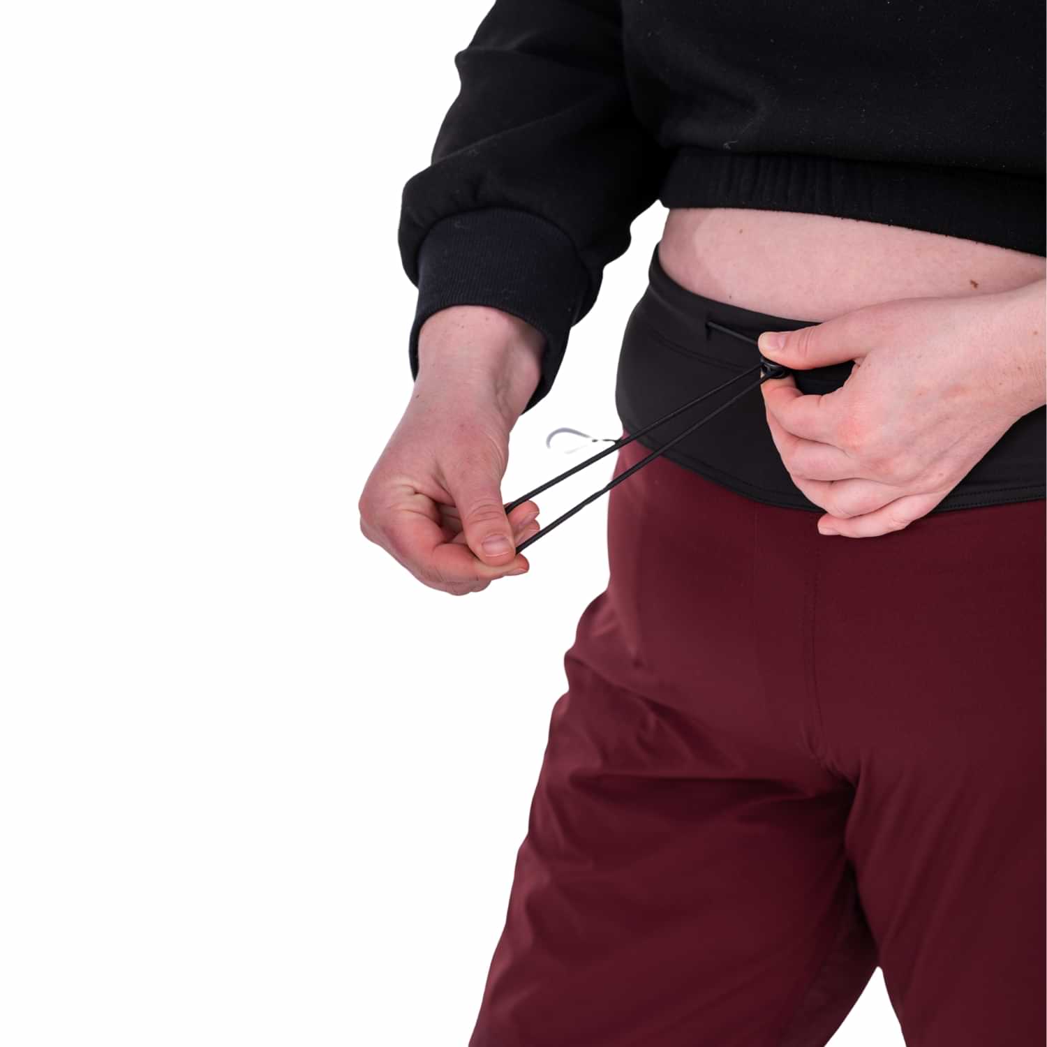 Close-up of Thicket Adventure Brecken Hiking Pants BELLY FIT adjustable waistband.