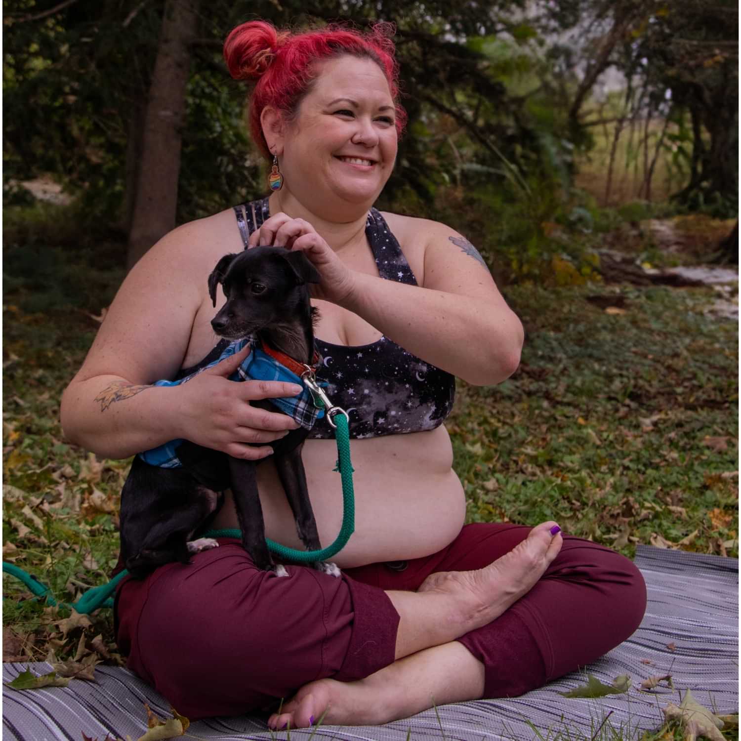 Plus size woman wearing Thicket Adventure Brecken Hiking Pants BELLY FIT outdoors with dog.