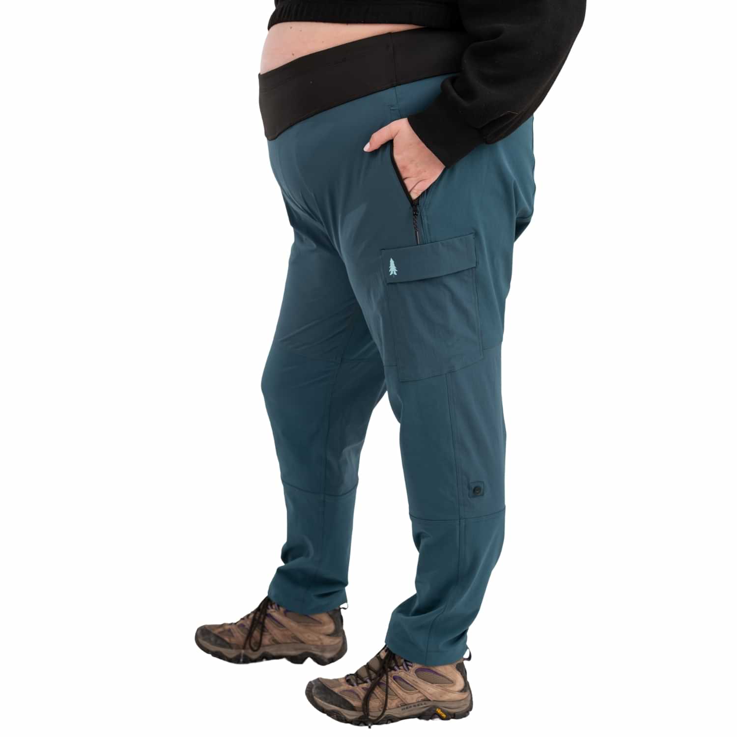Close-up of Thicket Adventure Brecken Hiking Pants BOOTY FIT in blue with secure zip pocket and cargo pocket detail, designed for plus sizes 18-34.