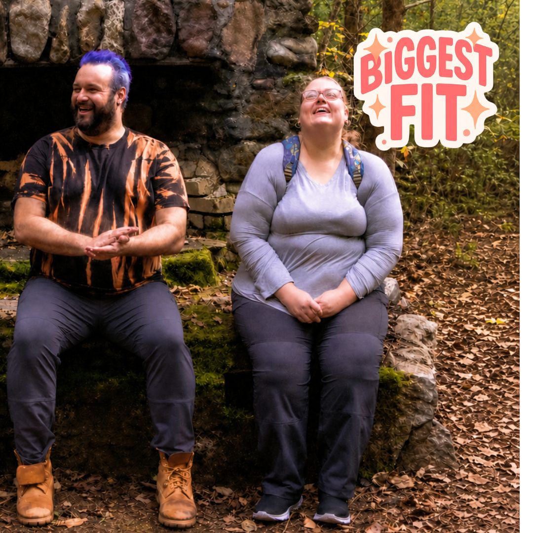 Two people sitting outdoors on a mossy stone structure wearing Thicket Adventure Brecken Travel Pants in plus sizes.